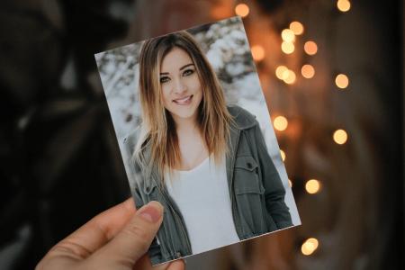 Christmas photo frame on hand
