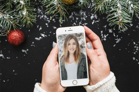 Iphone with your photos in christmas space