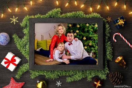 Christmas background and decoration with black wooden photo frames